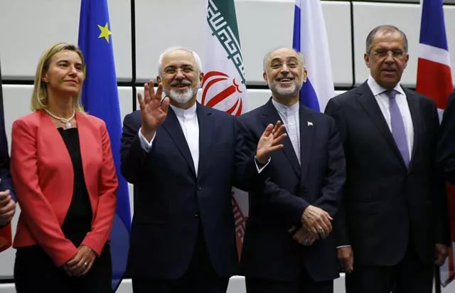iranian foreign minister mohammad javad zarif 2nd l gestures next to high representative of the european union for foreign affairs and security policy federica mogherini l iranian ambassador to iaea ali akbar salehi 2nd r and russian foreign minister sergey lavrov r as they pose for a family photo in vienna austria 14 july 2015 photo reuters iranian foreign minister mohammad javad zarif 2nd l gestures next to high representative of the european union for foreign affairs and security policy federica mogherini l iranian ambassador to iaea ali akbar salehi 2nd r and russian foreign minister sergey lavrov r as they pose for a family photo in vienna austria 14 july 2015 photo reuters