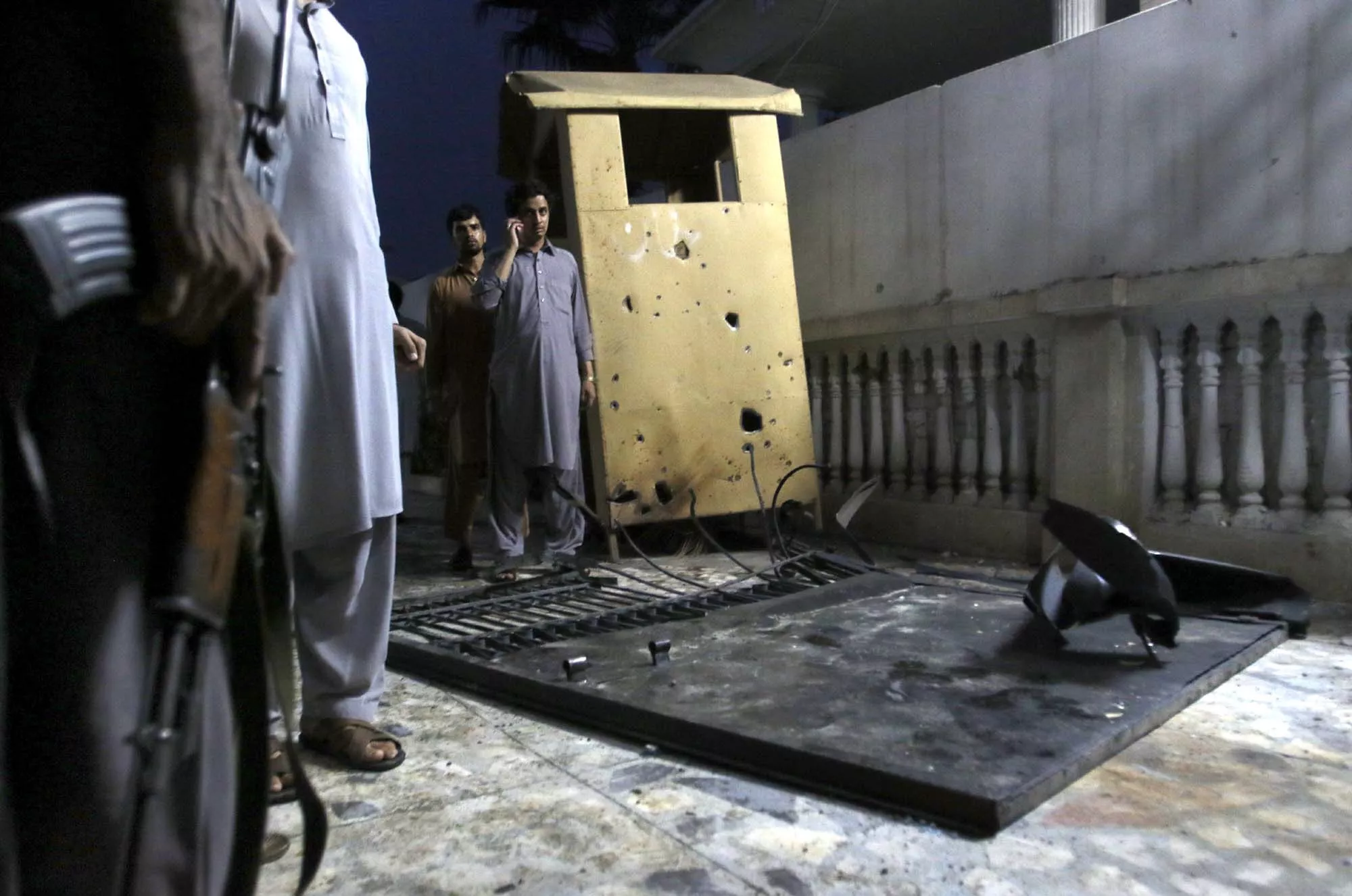 people gather outside the blast site in peshawar on july 15 2015 photo ppi people gather outside the blast site in peshawar on july 15 2015 photo ppi