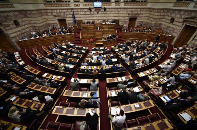 a final count showed 229 members of parliament out of 300 voted in favour of the measures photo afp a final count showed 229 members of parliament out of 300 voted in favour of the measures photo afp