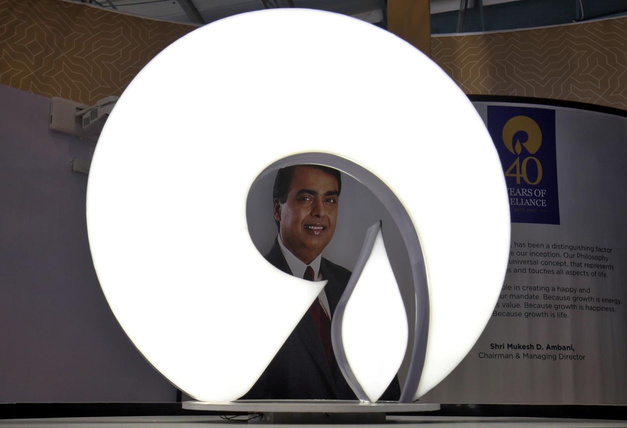 the logo of reliance industries is pictured in a stall at the vibrant gujarat global trade show at gandhinagar india january 17 2019 photo reuters