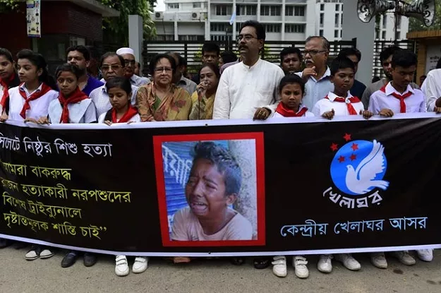 bangladeshi protesters carry a banner during a demonstration against the lynching of a 13 year old boy in dhaka photo afp bangladeshi protesters carry a banner during a demonstration against the lynching of a 13 year old boy in dhaka photo afp