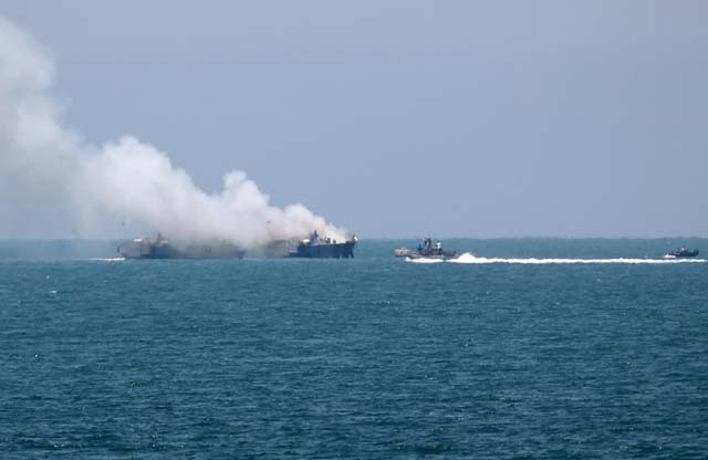 smokes rises from an egyptian coastguard vessel on the coast of northern sinai as seen from the border of southern gaza strip with egypt july 16 2015 photo reuters smokes rises from an egyptian coastguard vessel on the coast of northern sinai as seen from the border of southern gaza strip with egypt july 16 2015 photo reuters