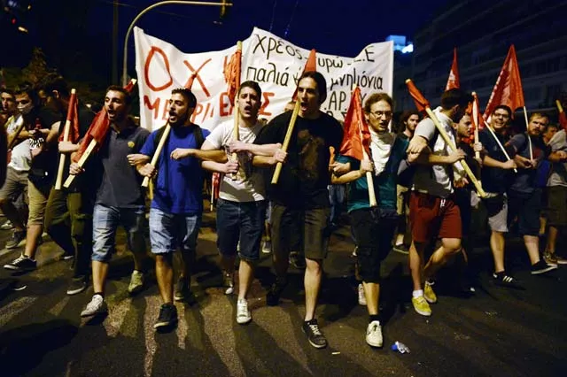 the government of alexis tsipras in athens came to power promising to do almost the exact opposite of what he has now persuaded his parliament to approve photo afp the government of alexis tsipras in athens came to power promising to do almost the exact opposite of what he has now persuaded his parliament to approve photo afp