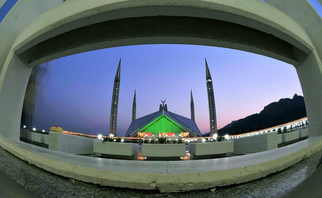 an illuminated view of faisal masjid decorated with colorful lights during holy fasting month of ramadan photo app an illuminated view of faisal masjid decorated with colorful lights during holy fasting month of ramadan photo app