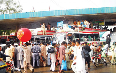 eid rush passengers left at mercy of transporters in islamabad eid rush passengers left at mercy of transporters in islamabad