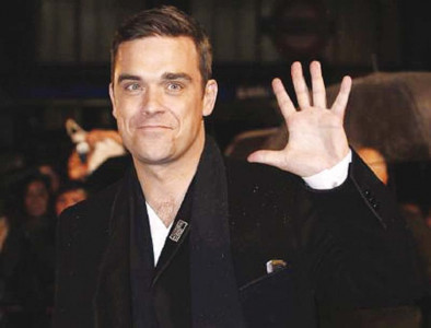 robbie williams turns auctioneer robbie williams turns auctioneer