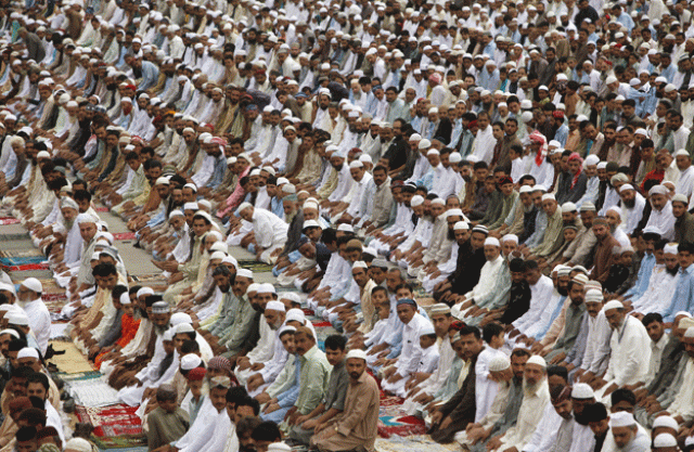 people attend eid al fitr prayers to mark the end of the holy fasting month of ramadan at the railway ground karachi pakistan july 18 2015 photo reuters people attend eid al fitr prayers to mark the end of the holy fasting month of ramadan at the railway ground karachi pakistan july 18 2015 photo reuters