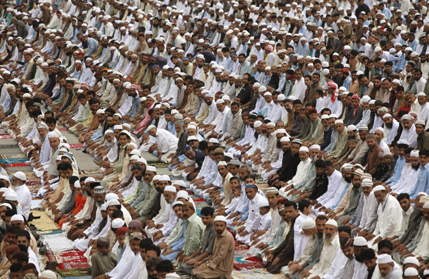 people attend eid al fitr prayers to mark the end of the holy fasting month of ramadan at the railway ground karachi pakistan july 18 2015 photo reuters people attend eid al fitr prayers to mark the end of the holy fasting month of ramadan at the railway ground karachi pakistan july 18 2015 photo reuters