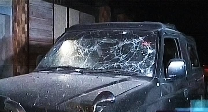 a car damaged in the blast photo express