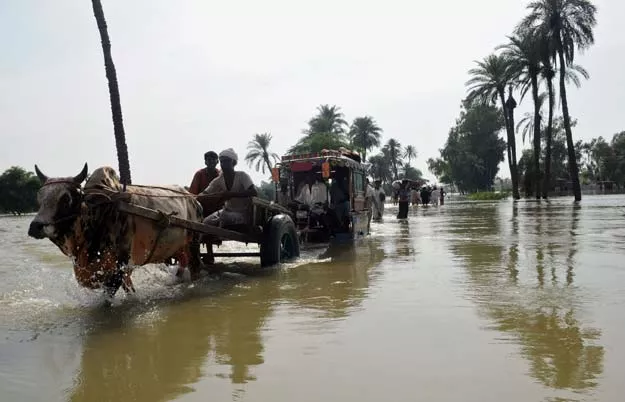 eight tonnes of relief goods distributed several villages inundated photo afp file eight tonnes of relief goods distributed several villages inundated photo afp file
