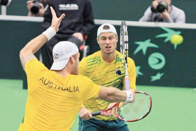 hewitt who won the davis cup titles in 1999 and 2003 won the fifth and decisive rubber against kazakhstan to ensure his team progress to semis photo afp