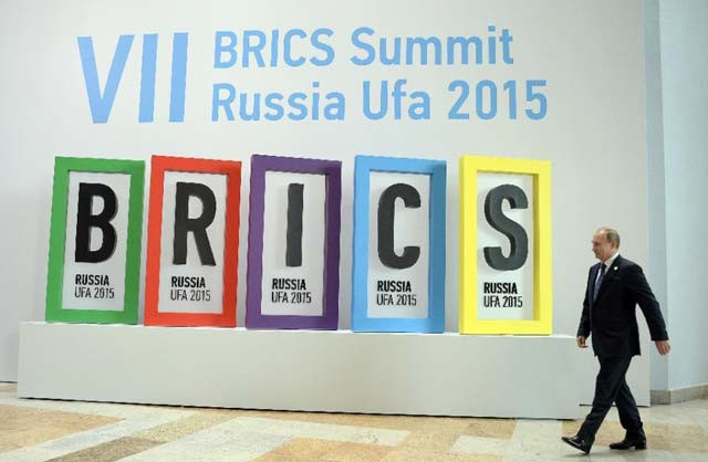 the bank 039 s opening comes two weeks after a brics summit hosted by russian president vladimir putin photo afp the bank 039 s opening comes two weeks after a brics summit hosted by russian president vladimir putin photo afp