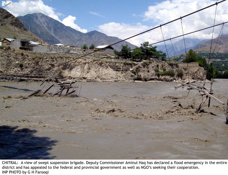 a damaged suspension bridge deputy commissioner aminul haq has declared a flood emergency in the chitral district and has sought support from the government and ngos photo inp