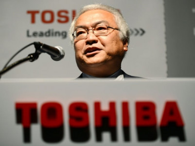 toshiba president top executives quit over 1 2 bn scandal