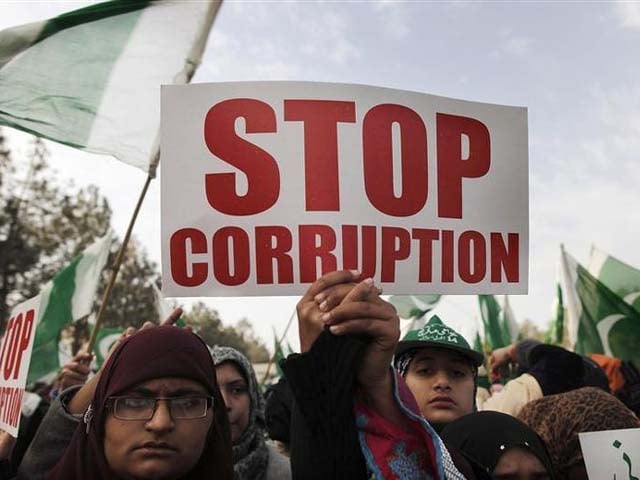protesters hold a sign as they take part in a protest in islamabad photo reuters