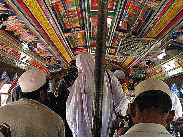 a woman travels in a bus in pakistan photo getty