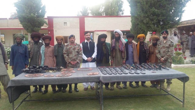commanders mir hazar khan marri and hayder mawali surrendered before fc authorities photo express commanders mir hazar khan marri and hayder mawali surrendered before fc authorities photo express