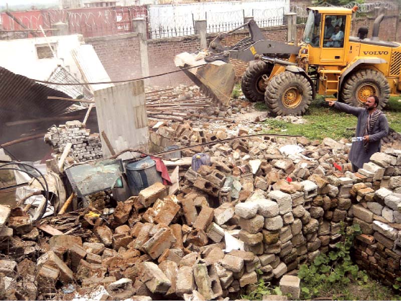 a small scale operation against slums is already under way in the capital photo file