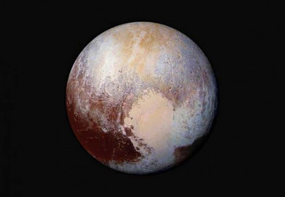 nasa spacecraft shows pluto wrapped in haze ice flows