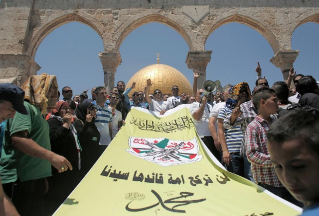 palestinians hold a banner reading quot muhammad pbuh is our leader quot during a protest against blasphemy on july 24 2015 at al aqsa mosque compound in jerusalem 039 s old city photo afp palestinians hold a banner reading quot muhammad pbuh is our leader quot during a protest against blasphemy on july 24 2015 at al aqsa mosque compound in jerusalem 039 s old city photo afp