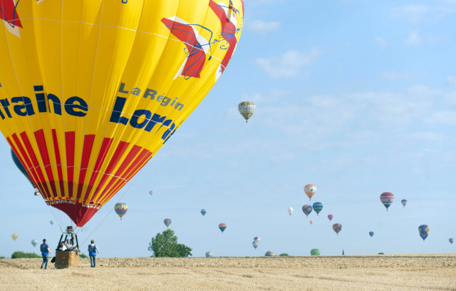 hot air balloons fly near chambley bussieres eastern france on july 26 2015 on the first day of the international air balloon meeting 039 lorraine mondial air ballons 039 photo afp hot air balloons fly near chambley bussieres eastern france on july 26 2015 on the first day of the international air balloon meeting 039 lorraine mondial air ballons 039 photo afp