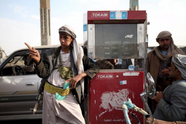 a worker with an ak 47 rifle stops the sale of petrol at a petrol station amid the fuel supply shortage in yemen 039 s capital sanaa july 26 2015 photo reuters a worker with an ak 47 rifle stops the sale of petrol at a petrol station amid the fuel supply shortage in yemen 039 s capital sanaa july 26 2015 photo reuters