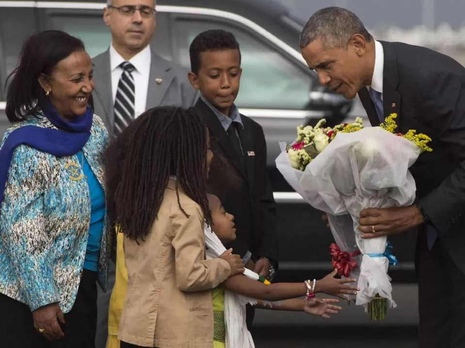 us president barack obama receives flowers upon his arrival at bole international airport in addis ababa on july 26 2015 photo afp us president barack obama receives flowers upon his arrival at bole international airport in addis ababa on july 26 2015 photo afp