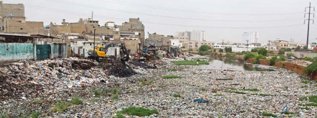 karachi commissioner aims to clear the city s storm water drains of encroachments and rubbish the work to clear this nullah in qayummabad has already begun photo aysha saleem express karachi commissioner aims to clear the city s storm water drains of encroachments and rubbish the work to clear this nullah in qayummabad has already begun photo aysha saleem express