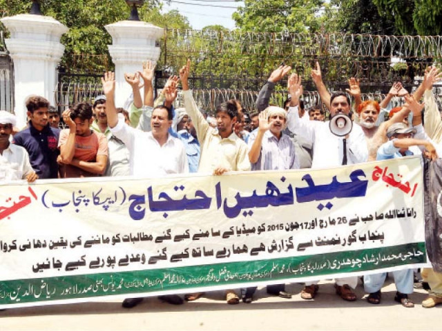 protesters seek implementation of demands agreed by a govt delegation after negotiations in june photo abid nawaz express protesters seek implementation of demands agreed by a govt delegation after negotiations in june photo abid nawaz express