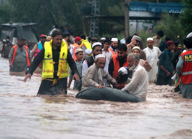 rescue workers moving people from affected areas in peshawar photo muhammad iqbal express