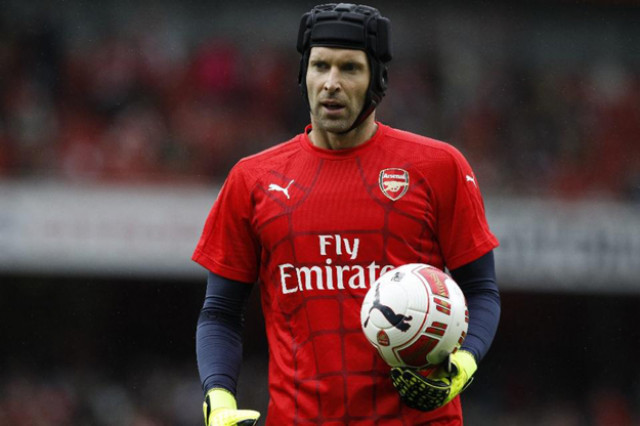 arsenal 039 s petr cech warms up ahead of the pre season friendly against wolfsburg at the emirates stadium photo afp arsenal 039 s petr cech warms up ahead of the pre season friendly against wolfsburg at the emirates stadium photo afp