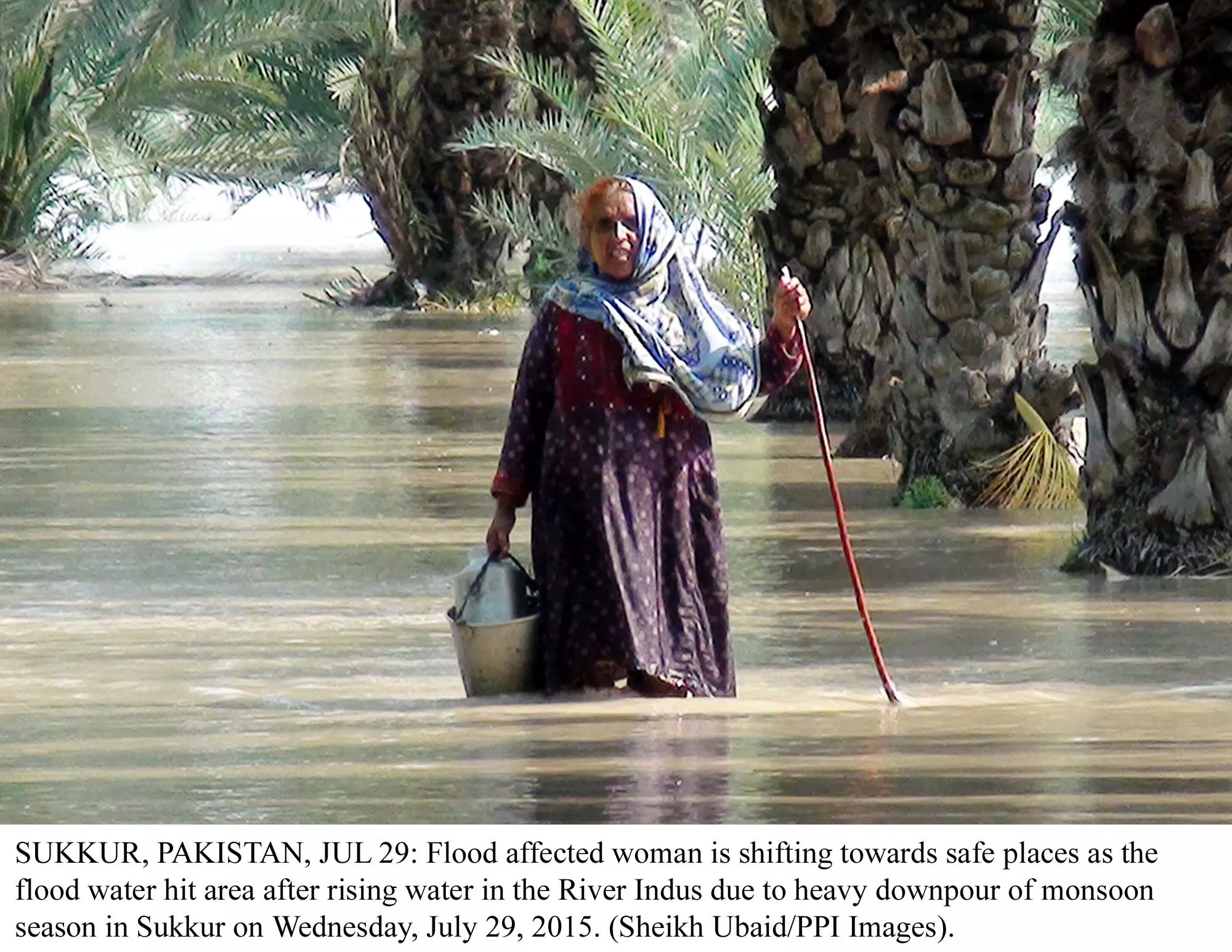 flood affected woman is shifting towards safe places as the flood water hit area after rising water in the river indus due to heavy downpour of monsoon season in sukkur on july 29 photo ppi flood affected woman is shifting towards safe places as the flood water hit area after rising water in the river indus due to heavy downpour of monsoon season in sukkur on july 29 photo ppi