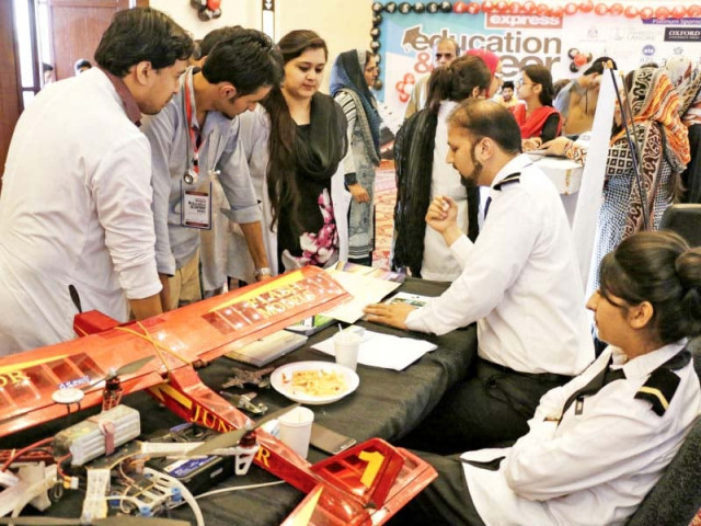visitors taking keen interest at stalls set up at the express education expo photos shafiq malik express visitors taking keen interest at stalls set up at the express education expo photos shafiq malik express