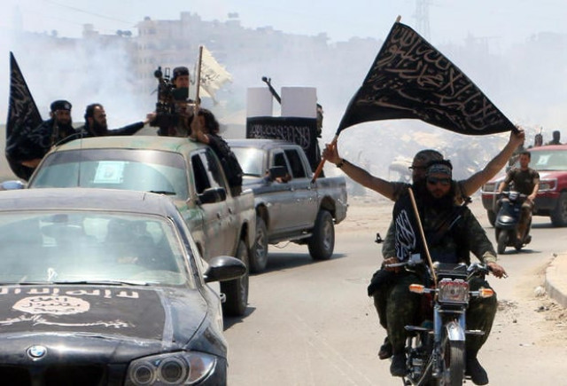 fighters from al qaeda 039 s syrian affiliate al nusra front drive in the syrian city of aleppo flying flags photo afp fighters from al qaeda 039 s syrian affiliate al nusra front drive in the syrian city of aleppo flying flags photo afp