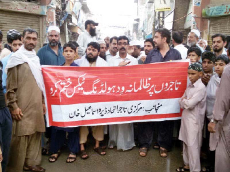 traders take to the streets in di khan photo online