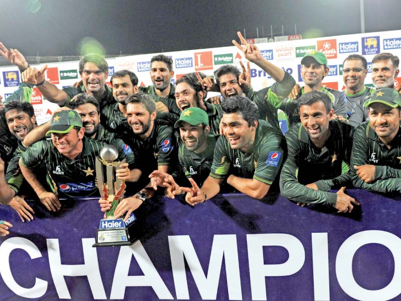the pakistani team poses for photographers after their victory photo afp
