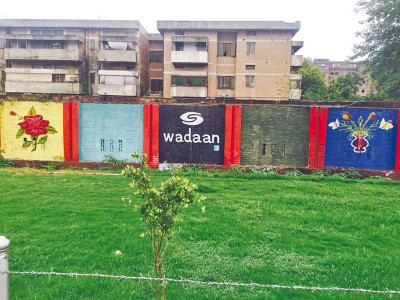 a new look volunteers add lustre to city s drab walls