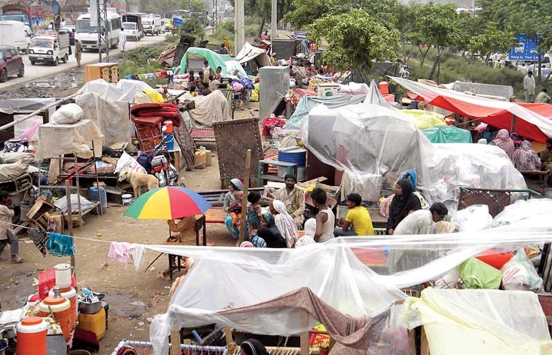 evicted residents have set up camp alongside the settlement photo nni