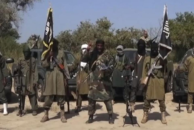 an image grab made on october 31 2014 from a video obtained by afp shows the leader of boko haram abubakar shekau delivering a speech photo afp