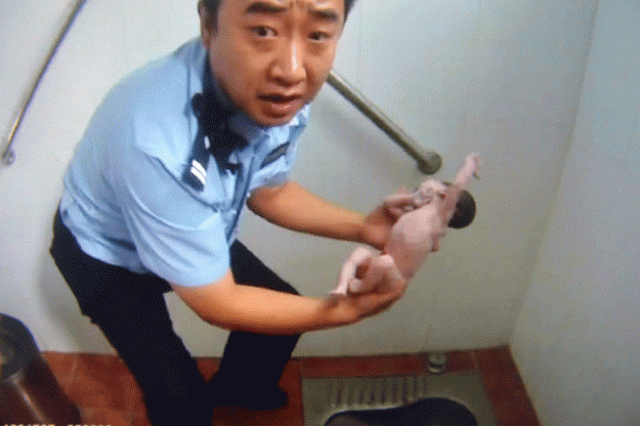 this frame grab of a police video taken on august 2 2015 shows a policeman holding an abandoned newborn baby in a public toilet in beijing a newborn baby girl was abandoned in a beijing public toilet and fell head first down the pipe reports said august 3 after her mother apparently gave birth in the facility photo afp this frame grab of a police video taken on august 2 2015 shows a policeman holding an abandoned newborn baby in a public toilet in beijing a newborn baby girl was abandoned in a beijing public toilet and fell head first down the pipe reports said august 3 after her mother apparently gave birth in the facility photo afp
