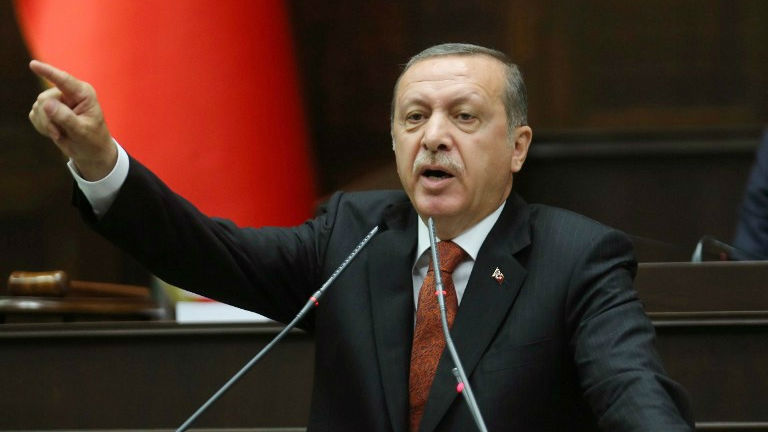 erdogan told reporters returning with him on a trip to asia that the kurdish authorities in northern iraq should be taking action against the pkk bases there photo afp