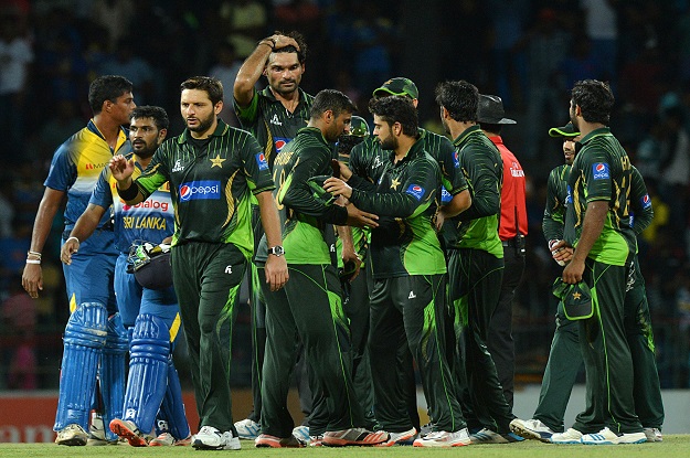 pakistan t20 cricket captain shahid afridi and teammates celebrate after victory during the first twenty20 international cricket match between sri lanka and pakistan photo afp