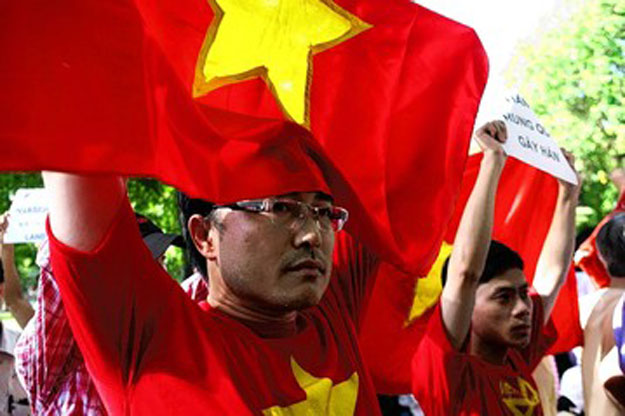 some 200 vietnamese demonstrators protested against china 039 s influence on the south china sea at the chinese embassy in hanoi on sunday photo afp