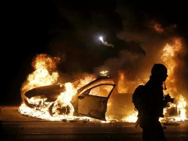 a police car burns on the street after a grand jury returned no indictment in the shooting of michael brown in ferguson missouri november 24 2014 photo reuters a police car burns on the street after a grand jury returned no indictment in the shooting of michael brown in ferguson missouri november 24 2014 photo reuters