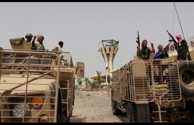 southern resistance fighters ride armoured personnel carriers at the international airport of yemen 039 s southern port city of aden july 14 2015 photo reuters