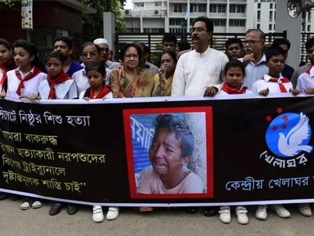 bangladeshi protesters carry a banner during a demonstration against the lynching of a 13 year old boy in dhaka photo afp bangladeshi protesters carry a banner during a demonstration against the lynching of a 13 year old boy in dhaka photo afp