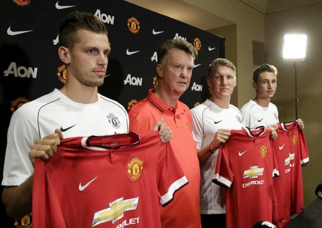 manchester united manager louis van gaal introduces new signings morgan schneiderlin bastian schweinsteiger and matteo darmian photo reuters