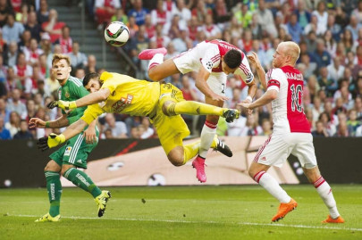 ajax dumped out of champions league