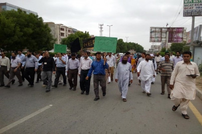 fight for autonomy varsity teachers protest against govt interference