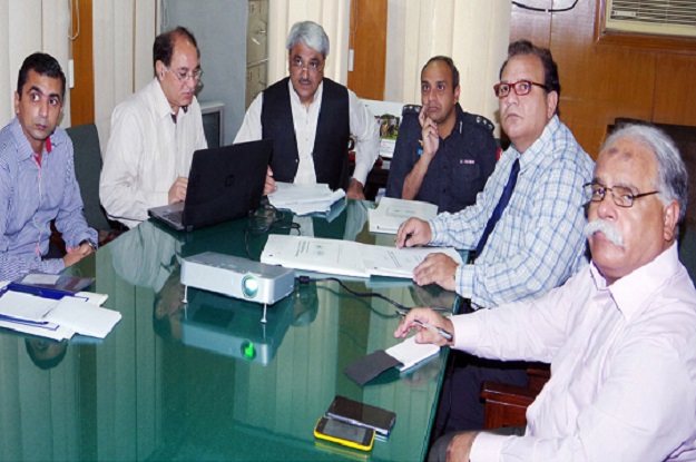 adviser to chief minister on health khawaja salman rafique presiding over a meeting photo nni